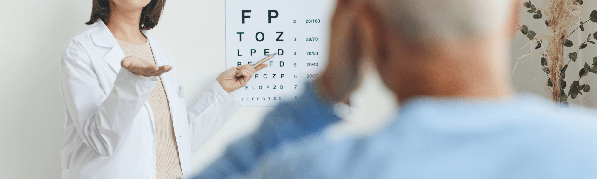 patients reading chart during an eye doctor exam 