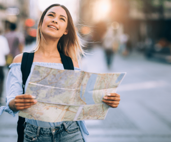 woman holding a map 